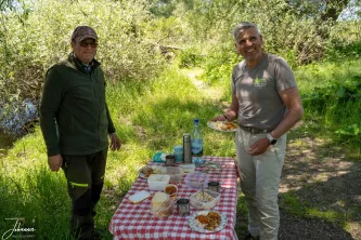 Explore the Danube Delta, a land of dazzling contrasts. Witness the perfect stillness of the water mirroring the vast blue sky, then share a smile over a delicious, secluded local lunch deep in the wilderness. From grand aerial views to intimate moments, these images capture the full heart of Europe's beautiful Bird Paradise.