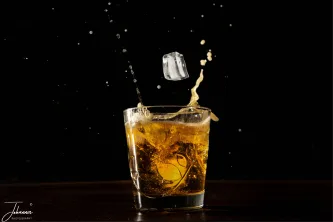 Assignment in the FotoWerkGroep to use the flash.
I created this splash photo. I used many cans of bear as the timing is very tricky. Too early, too late, no splash and finally some good photos. Used one filtser for back light, and a mirror on the opposite. Next used a small torch for additional light
Merged 2 photos with the main photo and added the ice cube in it.